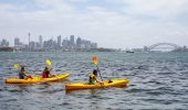 Friends enjoying a day of kayaking on Sydney Harbour, Sydney city