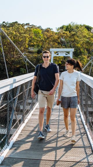 Couple enjoying a scenic walk around Parsley Bay, Vaucluse