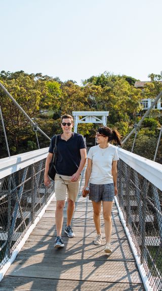 Couple enjoying a scenic walk around Parsley Bay, Vaucluse
