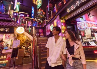 Couple enjoying Burwood Chinatown at night, Burwood