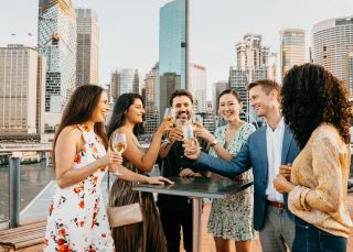 Friends enjoying drinks at The Rocks, Sydney