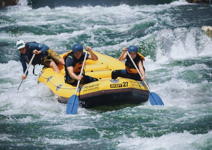 Couple enjoying a white water rafting experience at Penrith Whitewater Stadium in Sydney West