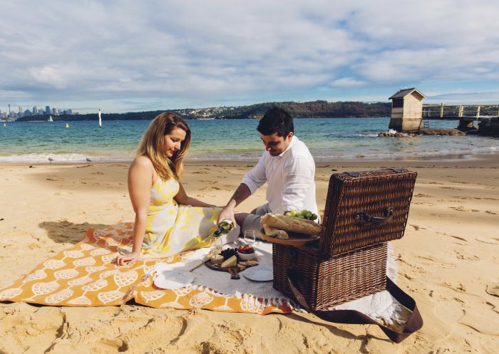 Couple enjoying Camp Cove, Watsons Bay