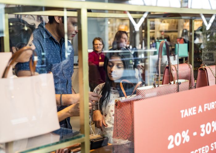 Family enjoying a visit to Birkenhead Point Brand Outlet centre in Drummoyne, Inner Sydney 