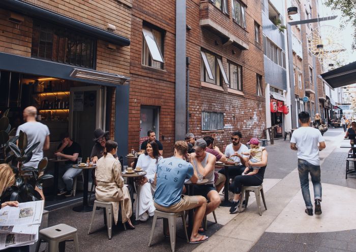 Patrons enjoying breakfast at laneway cafe Room 10 in Potts Point