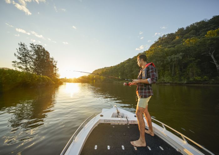 Man enjoying an afternoon of fishing on the Hawkesbury River, Wisemans Ferry