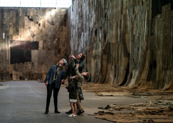 Family enjoying a self guided audio tour, Cockatoo Island 