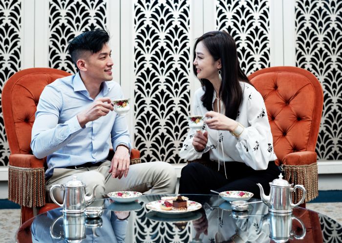 Couple enjoying The Tea Room QVB at Queen Victoria Building, Sydney CBD