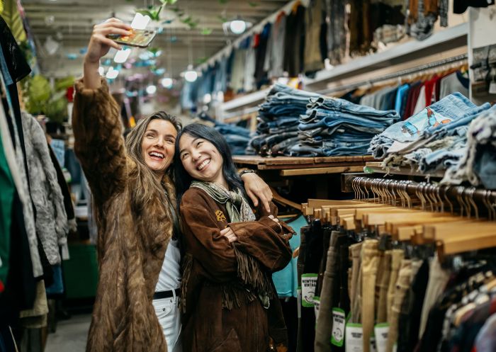 Young people dressing up in op shop in King St, Newtown 