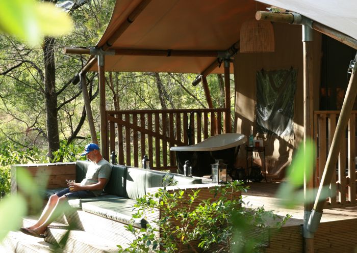 On the deck of one of the tented lodges at Ding Dang Doo - Credit: Ding Dang Doo