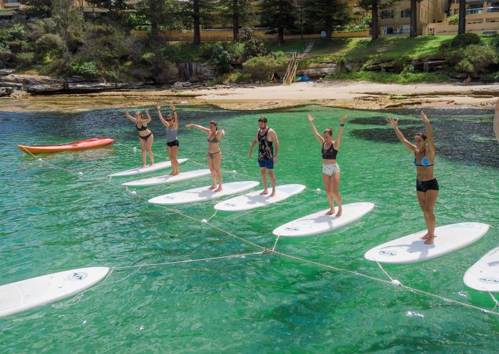 Yoga on stand-up paddle boards with Flow mOcean in Manly, Sydney North