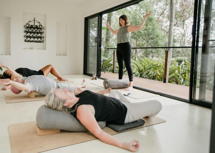 People enjoying yoga class at Paradise Yoga, Avalon Beach