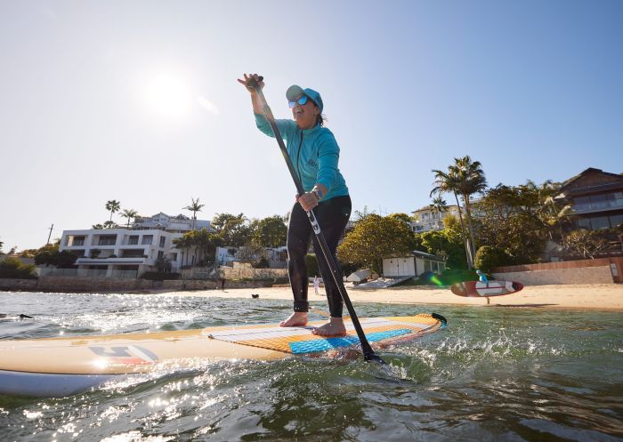 WATSSUP Watsons Bay Stand Up Paddling, Watsons Bay Woman enjoying WATSSUP Watsons Bay Stand Up Paddling, Watsons Bay