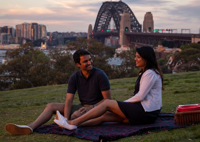 Couple enjoying a picnic at Observatory Hill, Millers Point