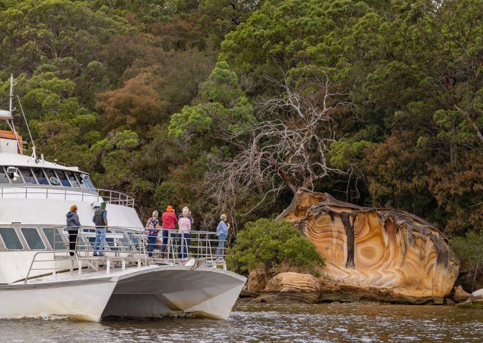 People enjoying spectacular unspoilt scenery on the The Riverboat Postman, Brooklyn