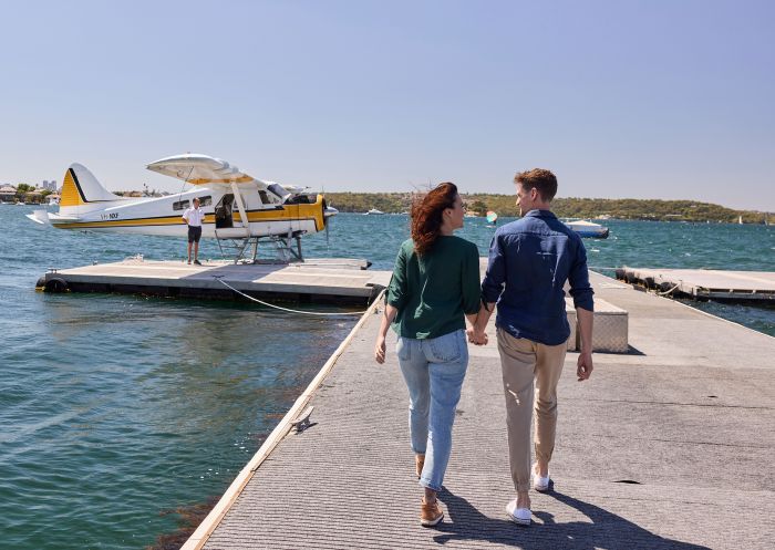 Couple on their way to a scenic flight with Sydney Seaplanes, Rose Bay