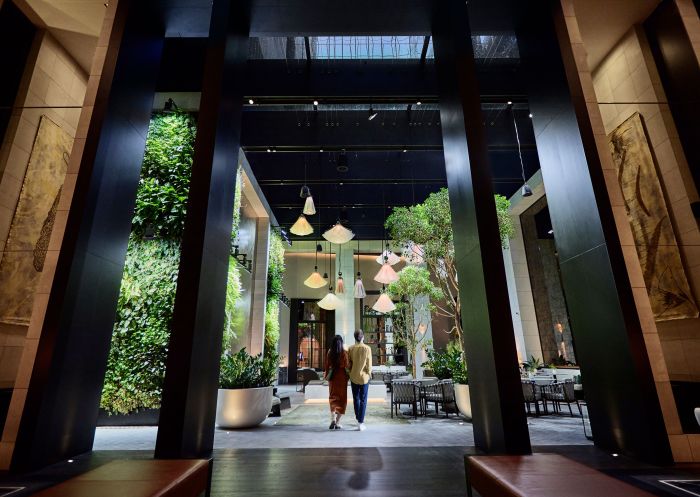 Couple walking through the foyer at Capella, Sydney