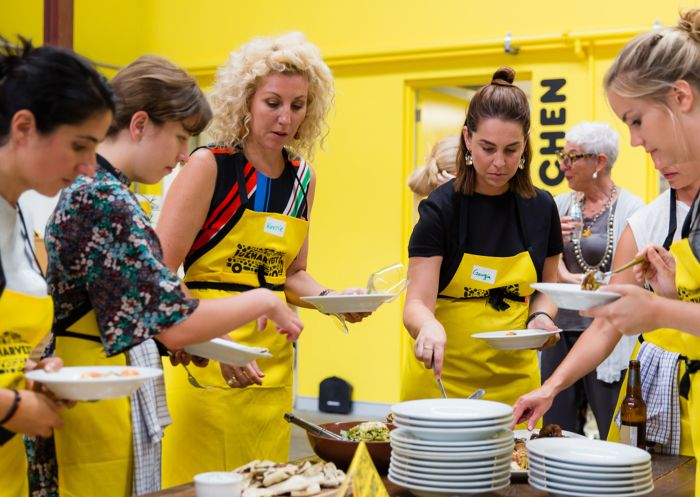 Group enjoying a Cooking for a Cause class at Ozharvest, Alexandria 