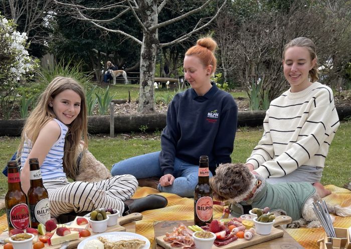 A family enjoying picnic at Bilpin Cider Co in Bilpin