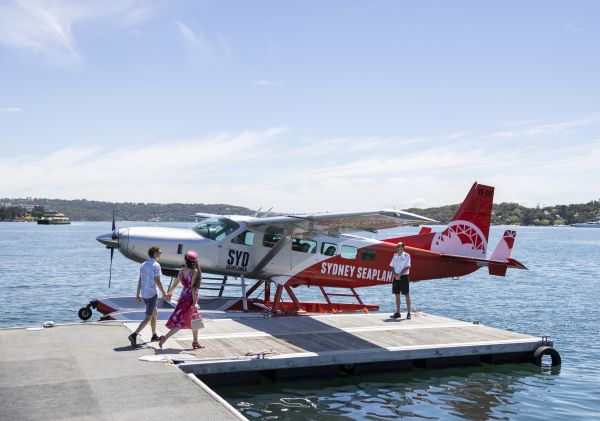 Couple ready to enjoy a Sydney Seaplanes flight from Rose Bay, Sydney east