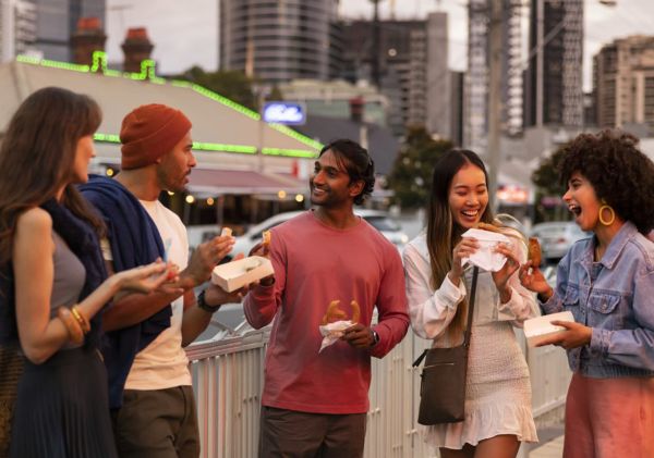 Friends walking through Little India, Harris Park