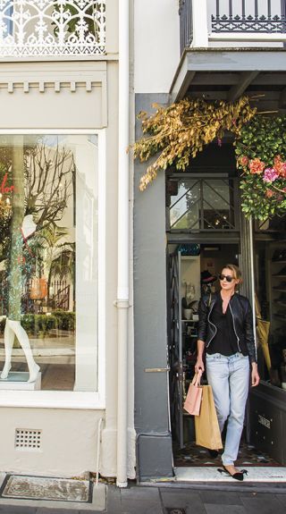 Woman shopping at Pelle Designer Recycled store, William Street in Paddington