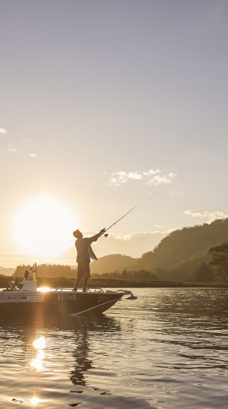 Friends enjoying an afternoon of fishing on the Hawkesbury River, Wisemans Ferry