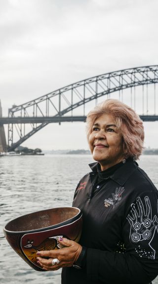 Margert Campbell performing a smoking ceremony at Blues Point Reserve, Blues Point in Sydney as part of the Dreamtime Southern X experience