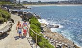 A family enjoy the Bondi to Bronte Walk in Sydney East