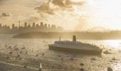 Sydney Harbour at sunset during the docking of the Queen Mary II