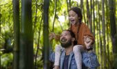 Family enjoying a visit to The Ian Potter Children's Wild Play Garden in Centennial Park, Sydney