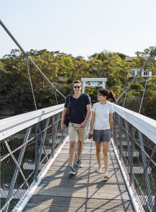 Couple enjoying a scenic walk around Parsley Bay, Vaucluse