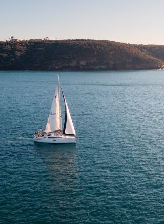 Yacht sailing through North Harbour, Sydney