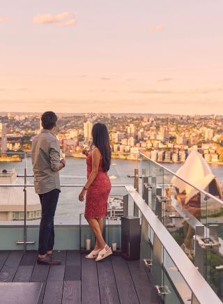 Couple enjoying view from The Aster Bar at The Intercontinental, Sydney