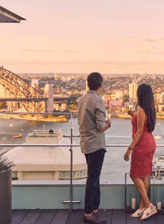 Couple enjoying view from The Aster Bar, The Intercontinental