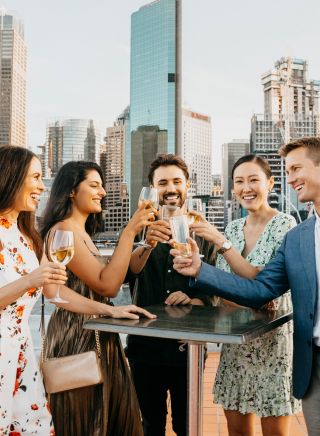 Friends enjoying drinks at The Rocks, Sydney