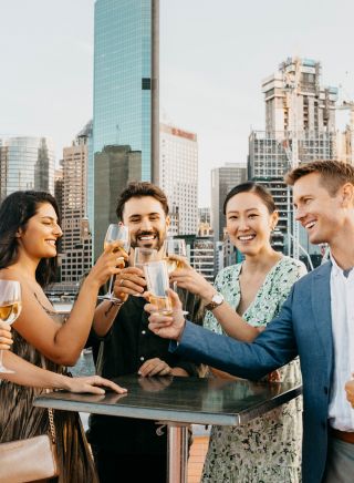 Friends enjoying drinks at The Rocks, Sydney