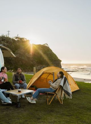 Friends with a campervan at Coledale Beach, Thirroul