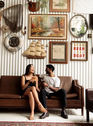 Couple enjoying beers at Willie The Boatman, St. Peters