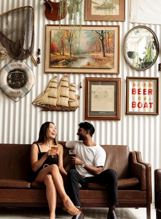 Couple enjoying beers at Willie The Boatman, St. Peters