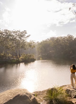 Woman enjoying a walk along the banks of the Parramatta River, Parramatta