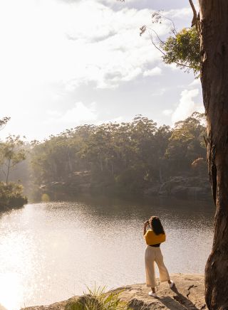 Woman enjoying a walk along the banks of the Parramatta River, Parramatta