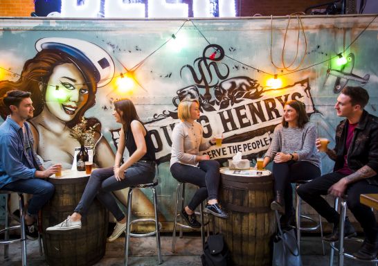 Patrons enjoying the beer at Young Henrys Brewery and Distillery in Newtown