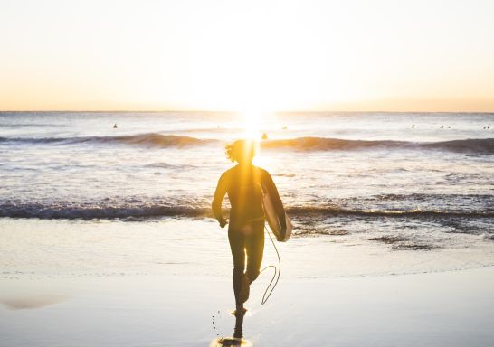 Surfer on Whale Beach at Sunrise, Northern Beaches