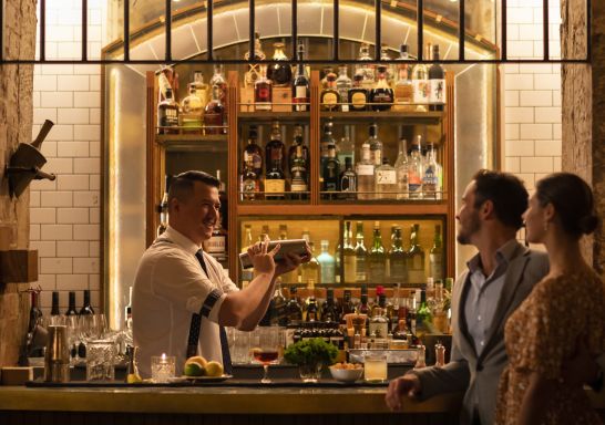 Couple ordering cocktails at Palmer and Co., Sydney