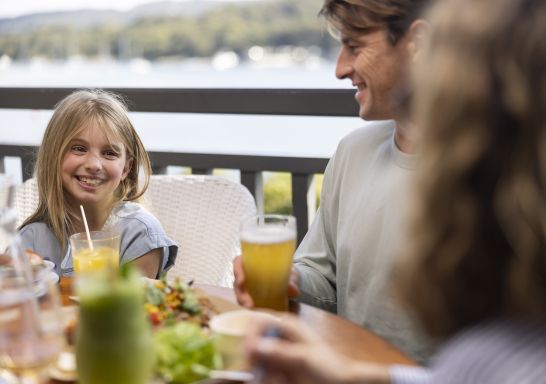 Family enjoying food and drink at The Newport, Newport with scenic views of Pittwater