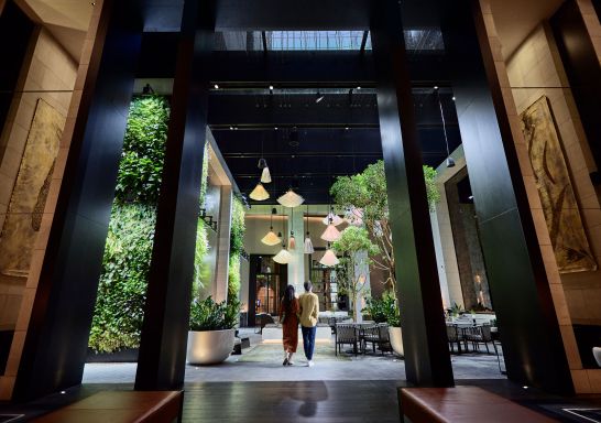 Couple walking through the foyer at Capella, Sydney